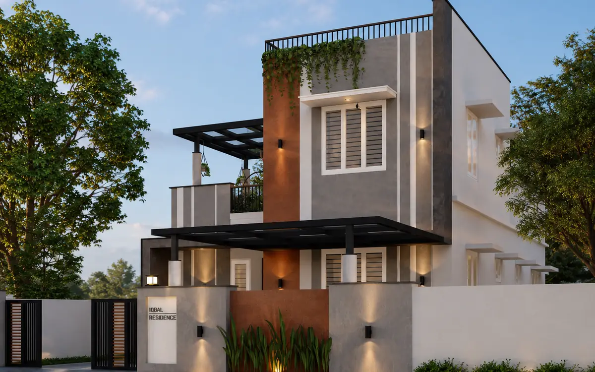 Iqbal Residence, Pondicherry — the corner elevation lit at dusk
